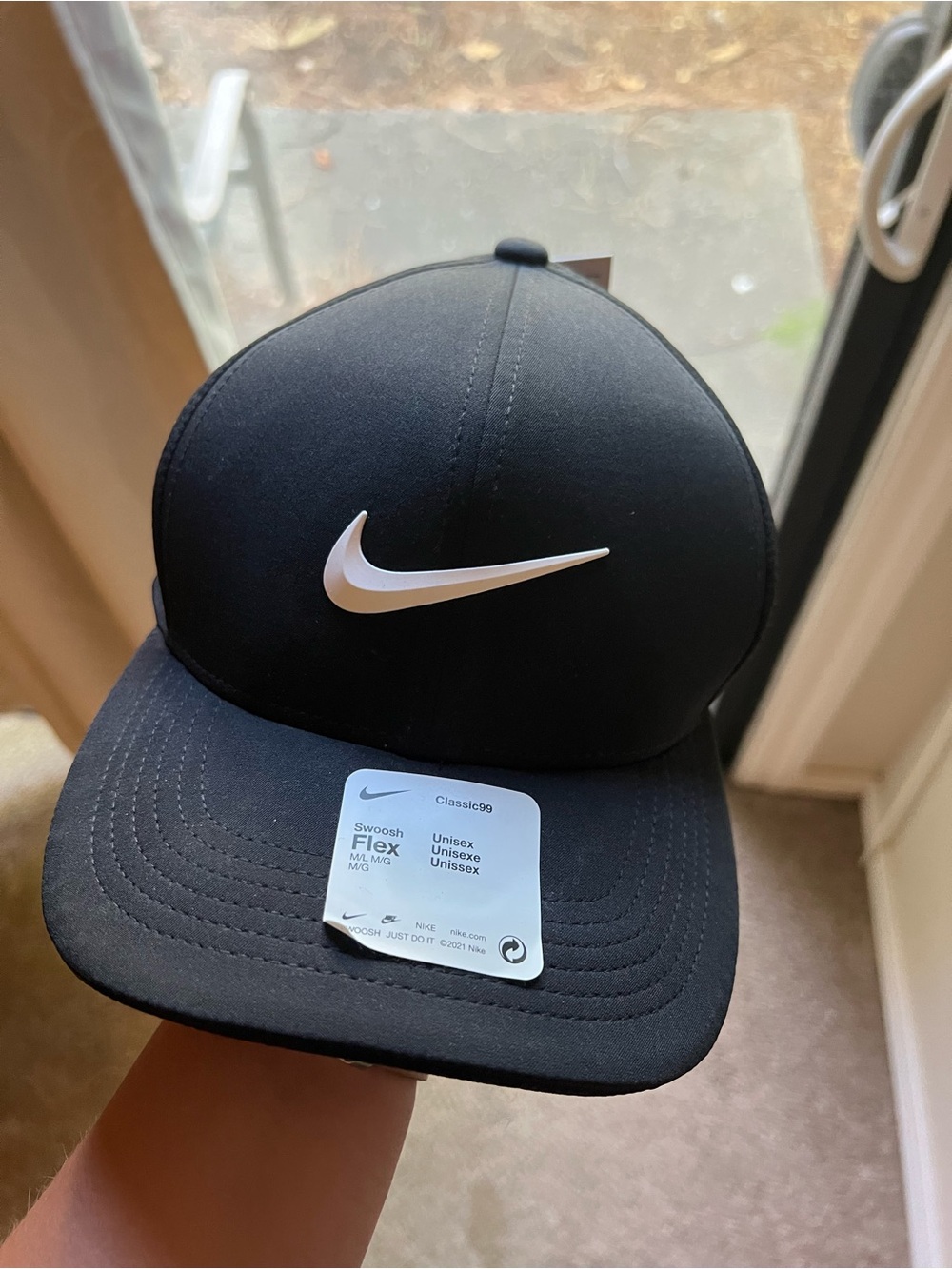 Nike Black Cap with White Swoosh Logo